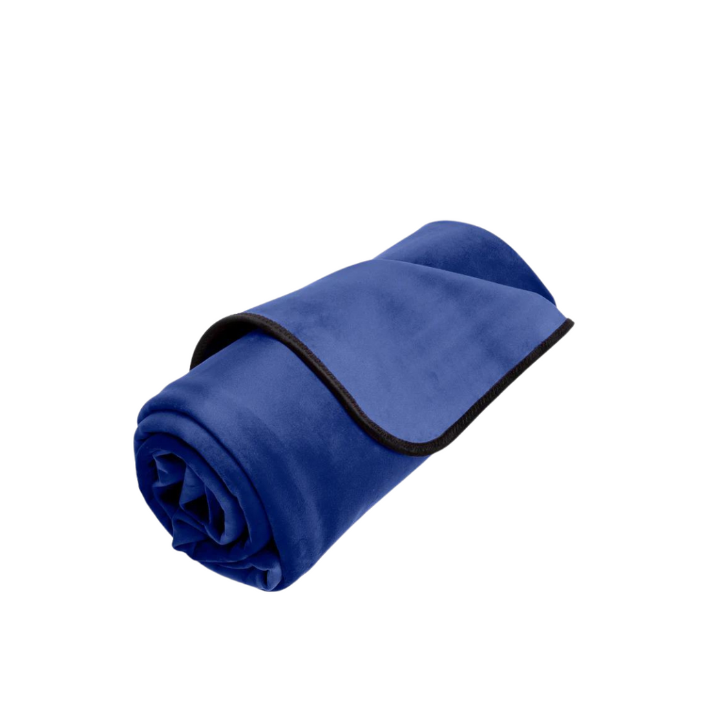 Royal blue microvelvet splash proof blanket by Liberator. A sexual wellness essential for anyone who squirts and for an easy clean up. Blanket if rolled up displayed against a solid white background. 
