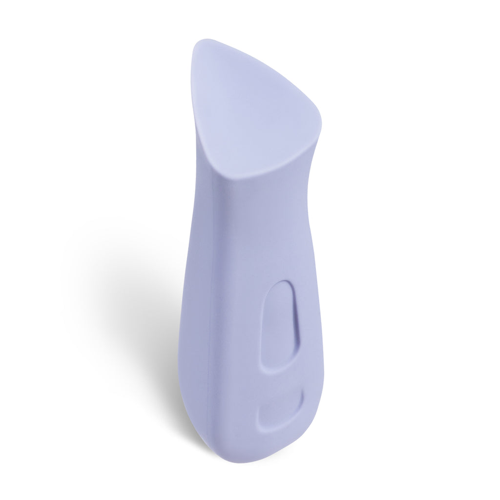 Prism shaped intimate massage Kip in lavender by Dame displayed standing vertically on solid white background.
