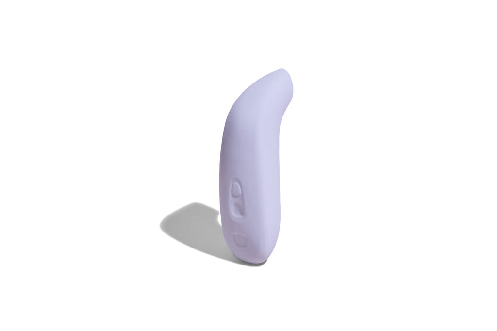 Lavender coloured AER by dame, suction stimulator displayed standing vertically on solid white background.