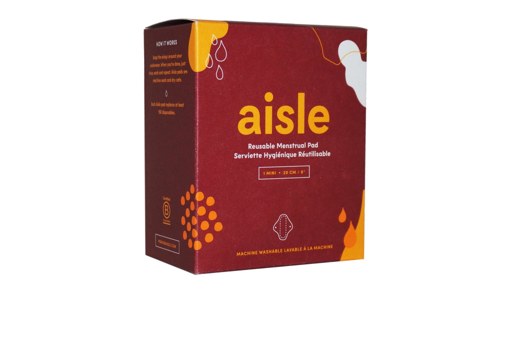 Red decorated box of Aisle mini reusable menstrual pad  in front of white background.