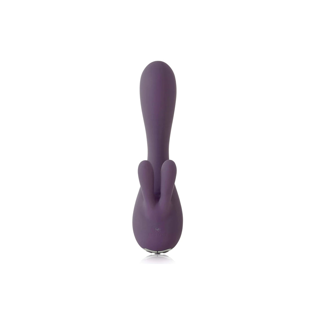 Deep purple Je Joue rabbit vibrator standing vertically on solid white background.