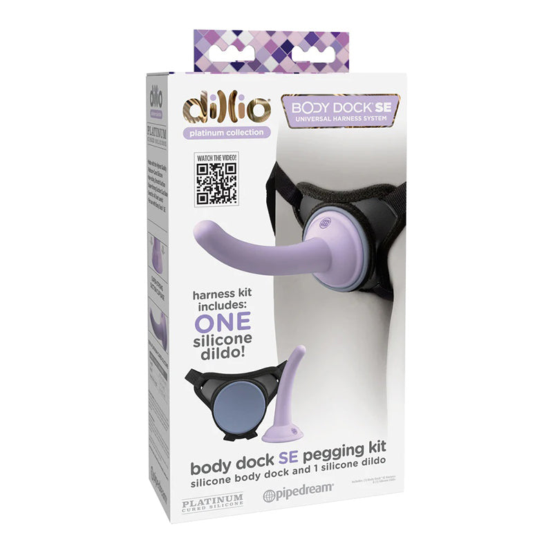 Dillio Universal Pegging Kit pictured against white background. The Harness is adjustable and comes with a 5" light purple dildo that suctions at the base. Dillio makes gender neutral, beginner friendly pegging and lgbtqia sexual wellness and pleasure products.