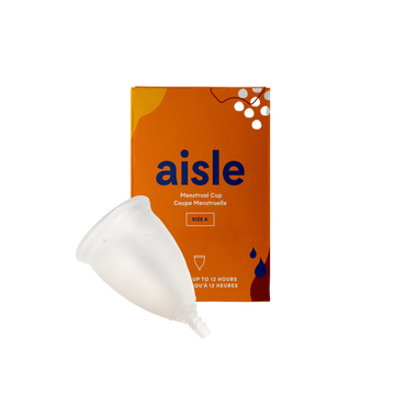 Orange decorated box of Aisle menstrual cup in size A with clear silicon menstrual cup placed in front on a white background.