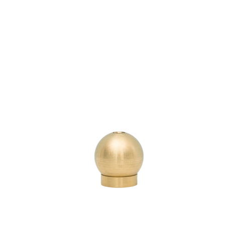Round brass incense holder by province apothecary displayed on white background.
