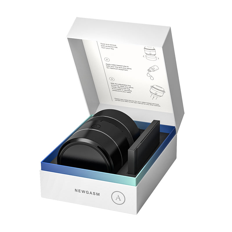 Arcwave compact male masterbator and stroker is displayed on solid white backgroud with product placed in box and lid flipped opened. Arcwave is a black handheld device fitted around the penis, designed to mimic stroking motions up and down.